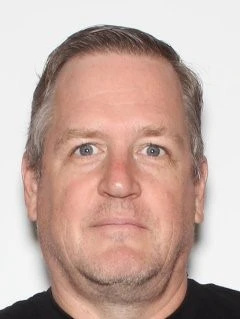 Christopher A Holmes